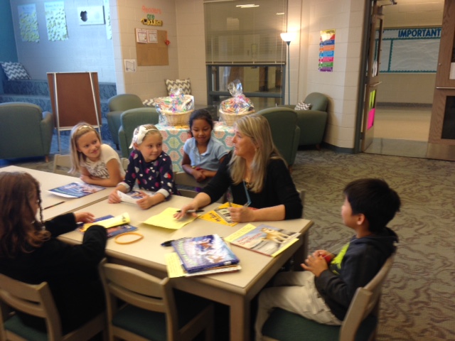 Shelley Gill talking with kids